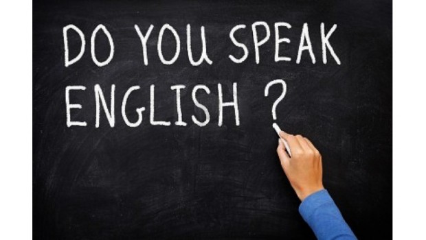 Hand writing Do you speak English? on a chalkboard